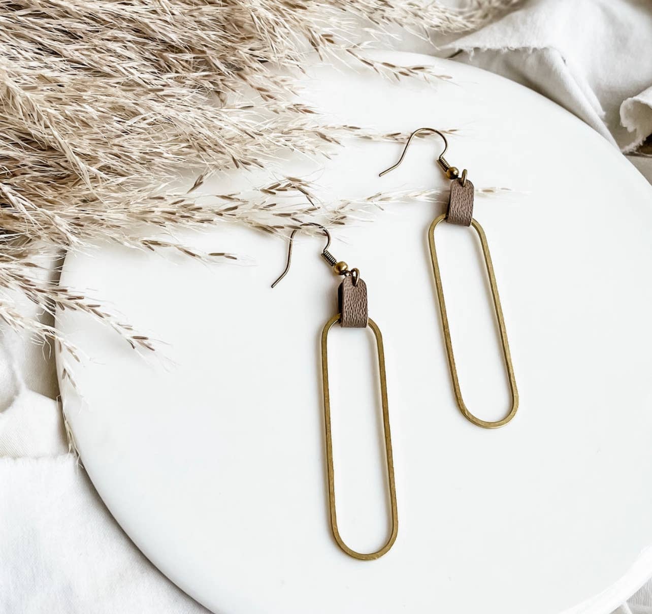 Latte Leather & Brass Oval Accent Earrings: Raw Brass Hooks